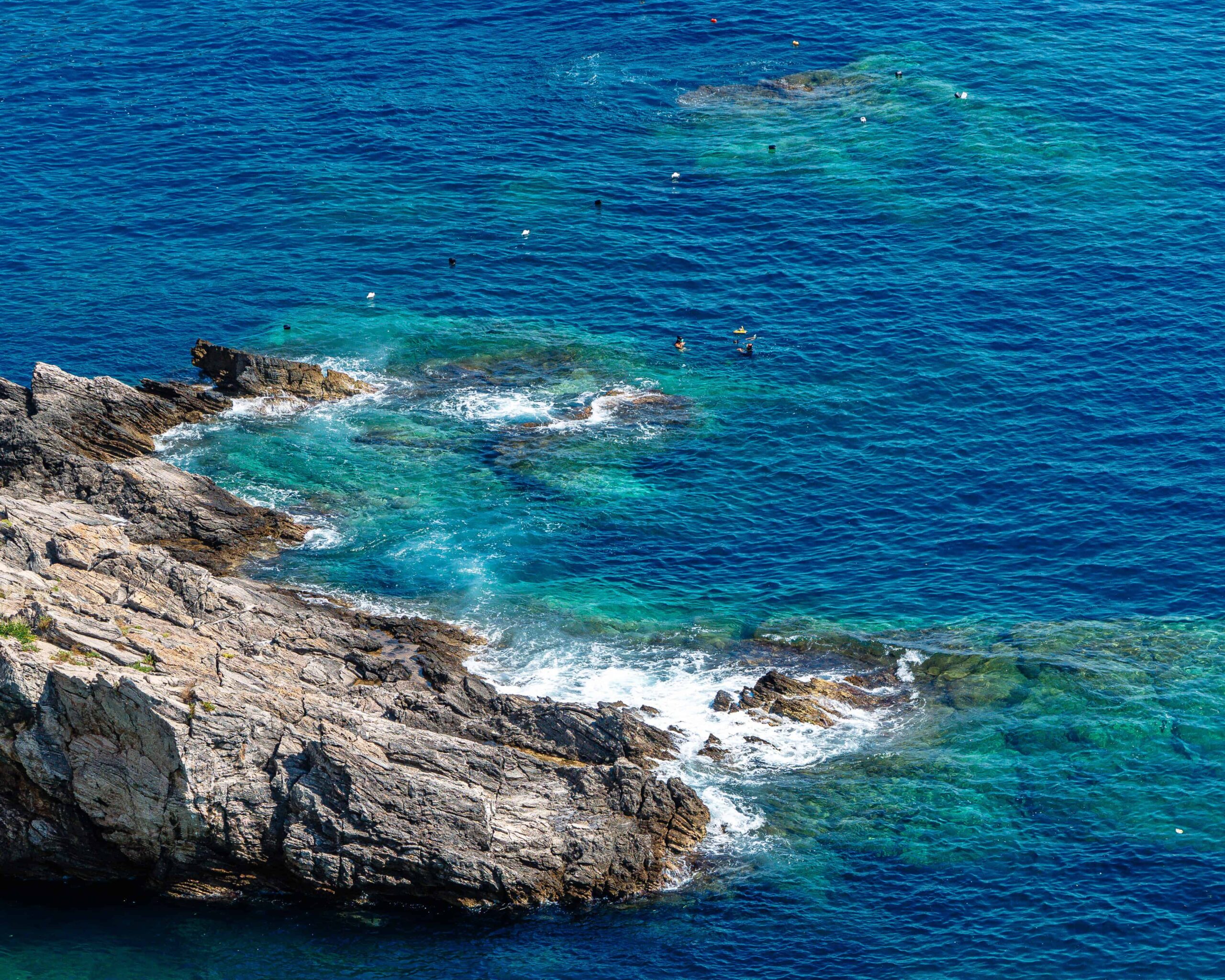 rocky outcrop in water