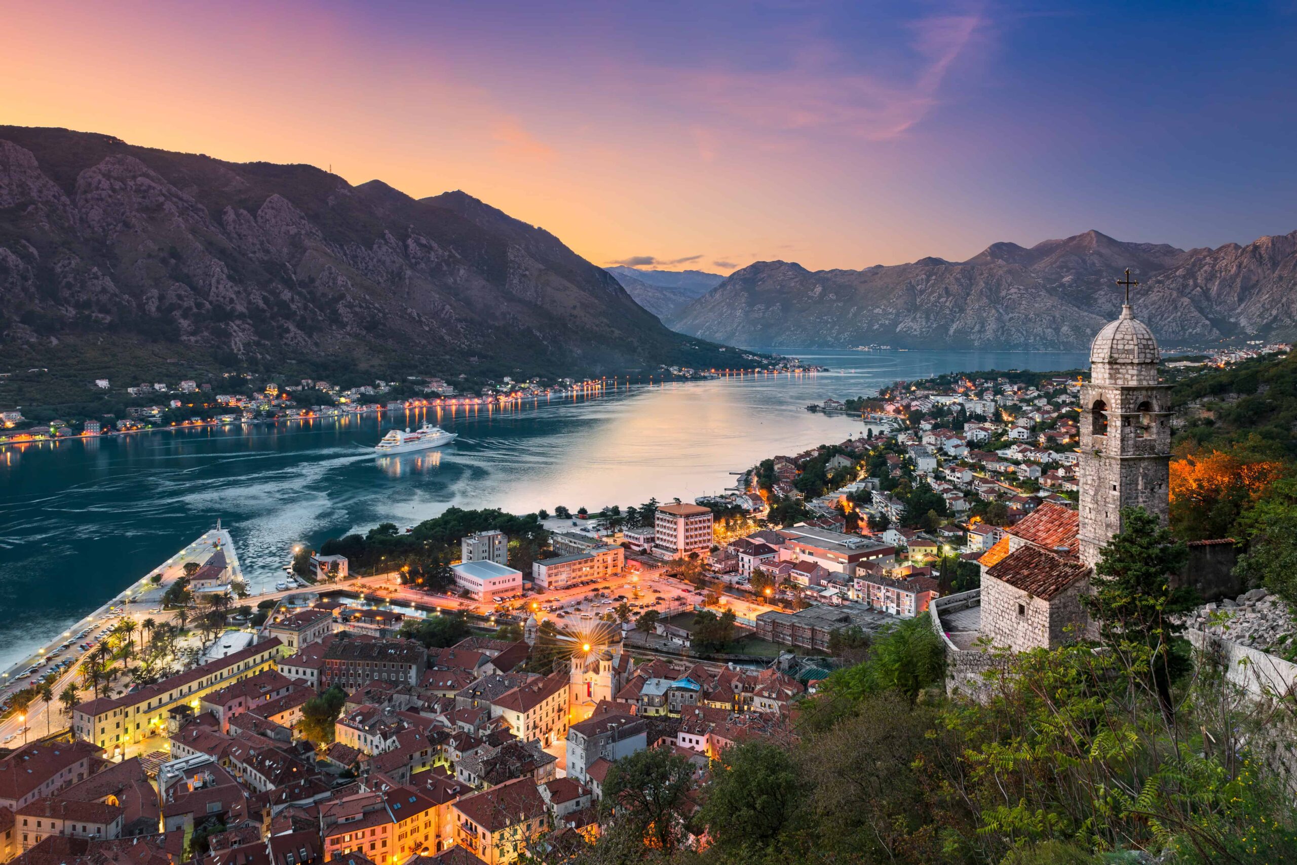 kotor town and bay with cruise ship on water
