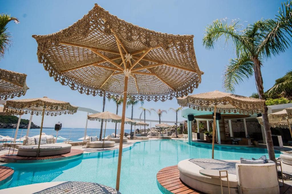 view of umbrella over pool