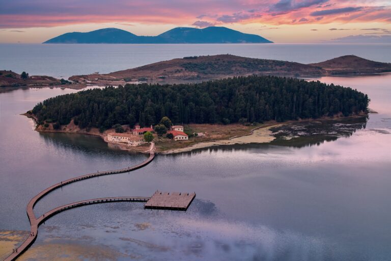 monastery on island with boardwalk leading to it